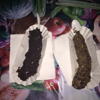 Bananarchy - Chocolate and peanut butter dipped with Oreos on the left and the cookie crumble dipped in vanilla on the right - Desserts Near Me - Austin, Texas