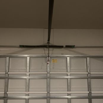 #1 Garage Door - Picture Broke Garage Spring.  Garage door only 3 years old. My home build in 2022. - Garage Door Services Near Me - Orlando, Florida