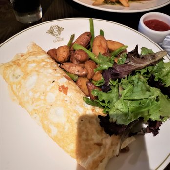 The Gage - Brunch - Mushroom and Spinach Omelet with egg white, potatoes, and salad - New American Near Me - Chicago, Illinois The Gage - Brunch - Mushroom and Spinach Omelet with egg white, potatoes, and salad - New American Near Me - Chicago, Illinois