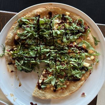Carmela's Restaurant - Prosciutto, fig, goat cheese, arugula greens pizza - Italian Near Me - Kingston, Massachusetts Carmela's Restaurant - Prosciutto, fig, goat cheese, arugula greens pizza - Italian Near Me - Kingston, Massachusetts