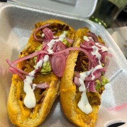 Luchita’s - Molletes (2) served with guacamole , sour cream and red onions