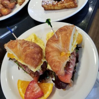 Sweet E's Cafe - Breakfast croissant with corned beef hash. Side of stuffed blueberry cream cheese French toast. - Cafes Near Me - Honolulu, Hawaii