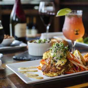 TRiO Restaurant & Market - a plate of food and a glass of beer - Wine Bars Near Me - Kitty Hawk, North Carolina TRiO Restaurant & Market - a plate of food and a glass of beer - Wine Bars Near Me - Kitty Hawk, North Carolina