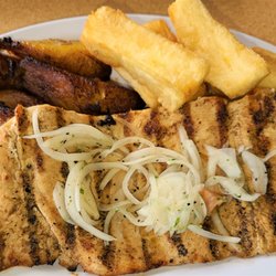 La Parrilla Rotisserie & Grill - Grilled Chicken Boneless Breast, served with 2 sides.