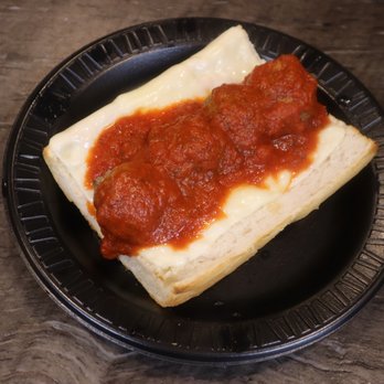 Tom & Jerry's - a piece of pizza on a plate - Desserts Near Me - Belvidere, Illinois Tom & Jerry's - a piece of pizza on a plate - Desserts Near Me - Belvidere, Illinois