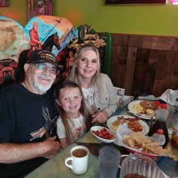 Got my daughter & my Grate Gandaughter and Son-inlaw enjoying our breakfast. Got my daughter & my Grate Gandaughter and Son-inlaw enjoying our breakfast.
