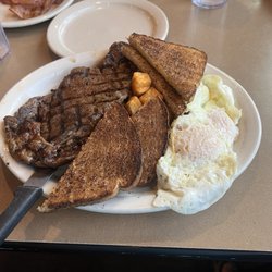 Ozzie's Place - Steak and Eggs with Wheat Toast and breakfast potatoes.