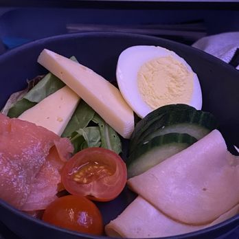 KLM Royal Dutch Airlines - Breakfast of cold cuts and cheese, egg, and vegetables - Airlines Near Me - Amstelveen, New Hampshire