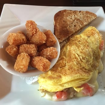 The Waterfront Hotel - Shrimp and crab omelette with tots and wheat toast - New American Near Me - Baltimore, Maryland The Waterfront Hotel - Shrimp and crab omelette with tots and wheat toast - New American Near Me - Baltimore, Maryland