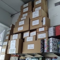Dickens Mail Box Postal and Shipping Center - Piles, piles of boxes. Different sizes and prices.