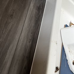 Joe's Floor Covering - The caulk already came up 3 months later in front of the shower. He didn't remove previous debris so it didn't adhere.