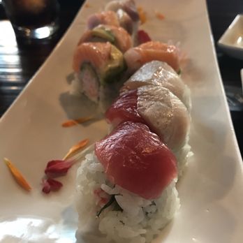 Zushi Sushi - Rainbow roll with edible flowers. - Japanese Near Me - Issaquah, Washington Zushi Sushi - Rainbow roll with edible flowers. - Japanese Near Me - Issaquah, Washington