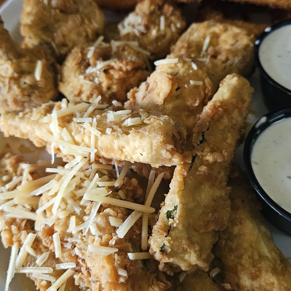 Hatch Cover - Appetizer sampler with (top to bottom) onion rings, fried mushrooms, and fried zucchini. - Bars Near Me - Colorado Springs, Colorado