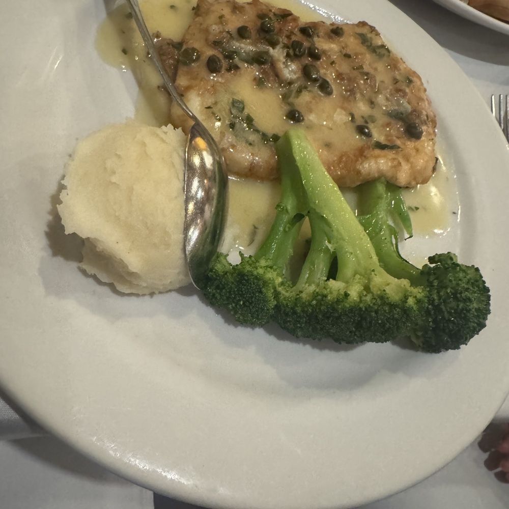 Mezza Luna Restaurant - Calamari Dore Piccata - Italian Near Me - Half Moon Bay, California Mezza Luna Restaurant - Calamari Dore Piccata - Italian Near Me - Half Moon Bay, California