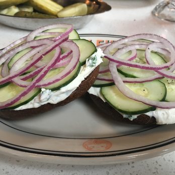 Mamaleh's Delicatessen - Pumpkernickel Bagel, Scallion shmear, cucumber and red onion - Delis Near Me - Cambridge, Massachusetts