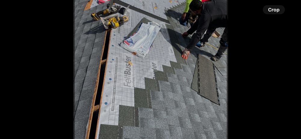 Slide of Adam’s Roofing