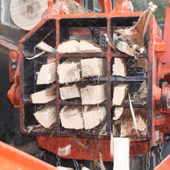 William A. Day Jr. & Sons Logging & Firewood - Some firewood getting split before it goes into the tumbler to get rid of the small splinters. - Firewood Near Me - Porter, Maine William A. Day Jr. & Sons Logging & Firewood - Some firewood getting split before it goes into the tumbler to get rid of the small splinters. - Firewood Near Me - Porter, Maine