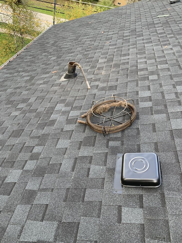 Slide of Benchmark Plumbing and Rodding