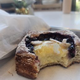 Vanilla almond Danish - seasonal fruit with vanilla custard and a thin layer of vanilla paste in a light flaky pasty. SO GOOD! Vanilla almond Danish - seasonal fruit with vanilla custard and a thin layer of vanilla paste in a light flaky pasty. SO GOOD!