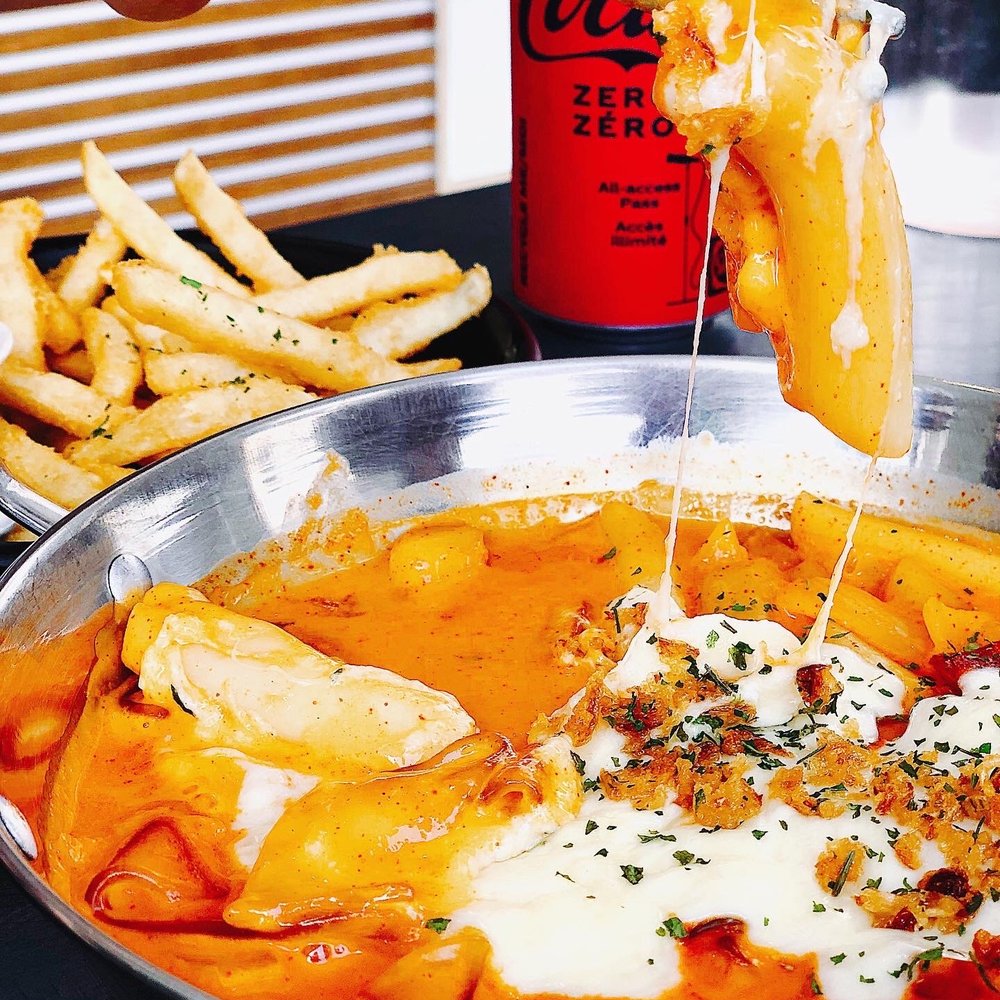 Woojoo Bunsik - rose tteokbokki with added flat sweet potato noodles and cheese - Korean Near Me - Toronto, Ontario Woojoo Bunsik - rose tteokbokki with added flat sweet potato noodles and cheese - Korean Near Me - Toronto, Ontario