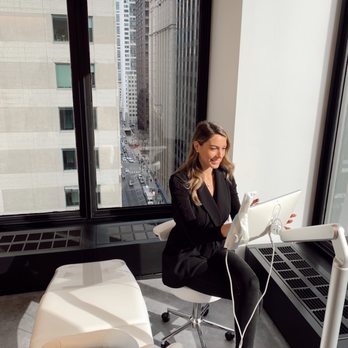 Impress - Our treatment coordinator excitingly preparing for her next patient. - Orthodontists Near Me - Chicago, Illinois Impress - Our treatment coordinator excitingly preparing for her next patient. - Orthodontists Near Me - Chicago, Illinois