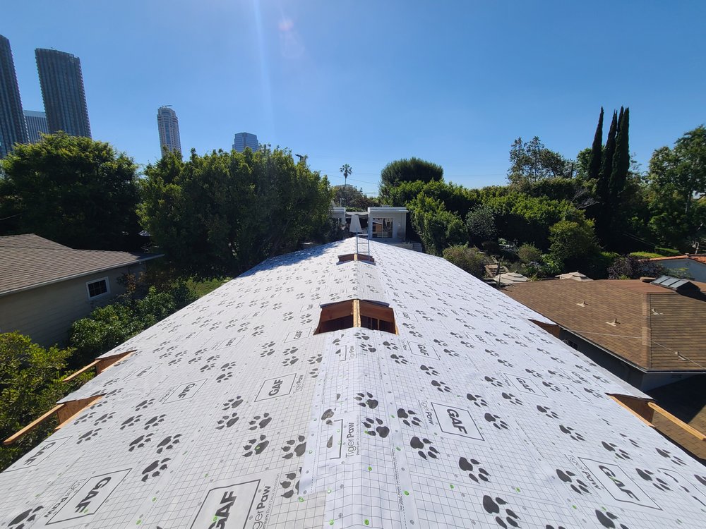 Slide of CAL Roofing Expert