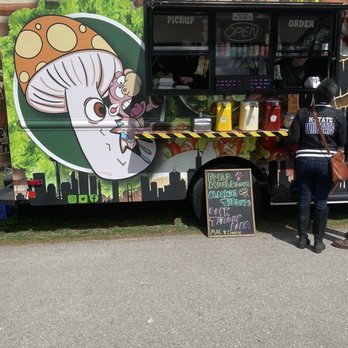 Omnivorium - a food truck parked in a parking lot - Food Trucks Near Me