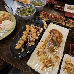 Calamari tempura, garlic edamame, popcorn lobster roll Calamari tempura, garlic edamame, popcorn lobster roll