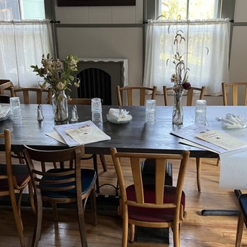 The Old Foundation - a dining room with a table and chairs - Bars Near Me - Kenoza Lake, New York
