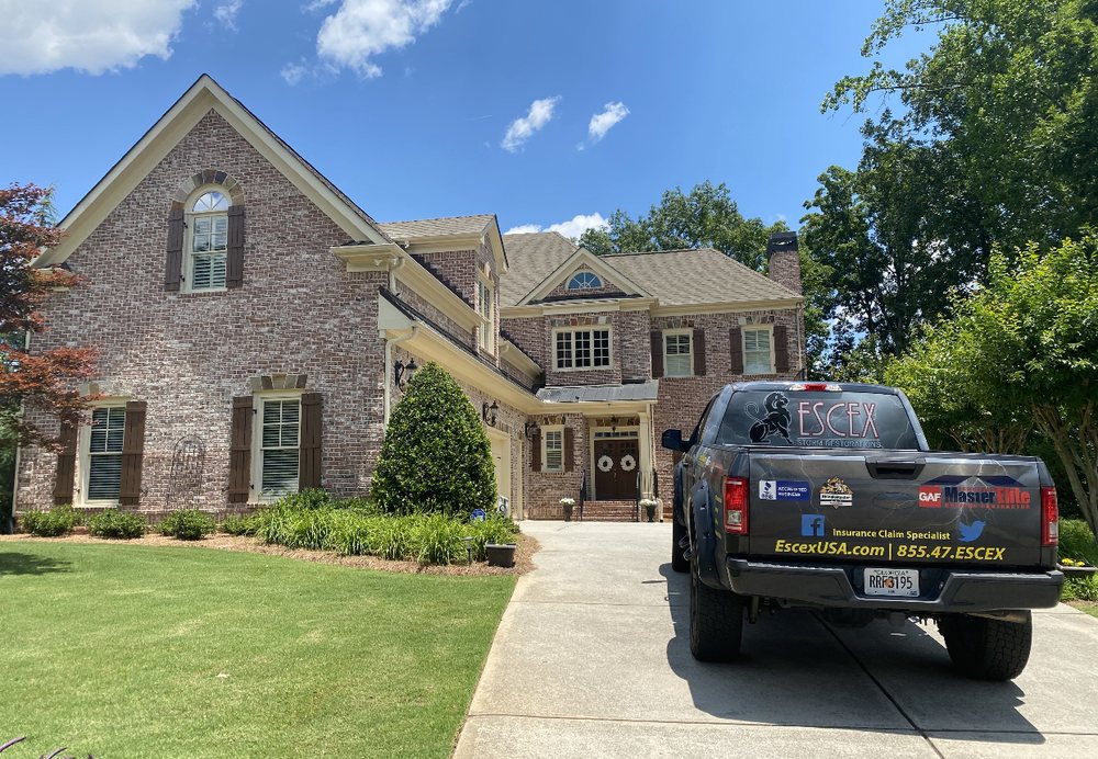 Slide of Escex Roofing and Restorations