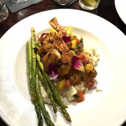 The Library Bar & Grill - Mahi on a bit of risotto... shrimp topper and a mango salsa with grilled asparagus.