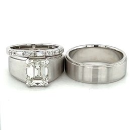 My engagement and wedding ring and my husband's wedding band My engagement and wedding ring and my husband's wedding band