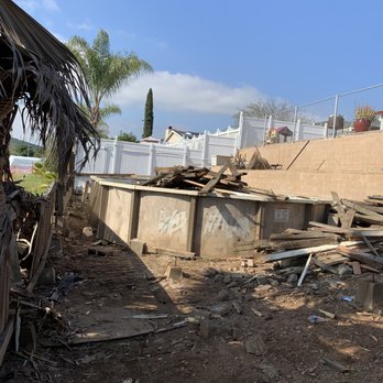 OVS Demolition - Half way pool and deck demolition - Demolition Services Near Me