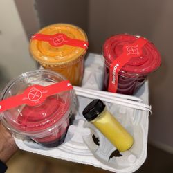 The Montclair Juicerie - The Heart Beet (red) The Super THE THREE POINT SHOT THE IMMUNITY JUICE (orange) all so good!!