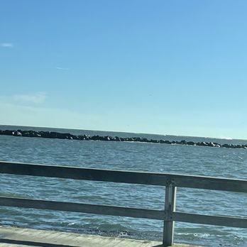 Ocean City Inlet - a bench overlooking the water - Music Venues Near Me - Ocean City, Maryland Ocean City Inlet - a bench overlooking the water - Music Venues Near Me - Ocean City, Maryland