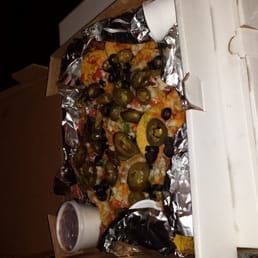 a panada pizza with peppers and olives