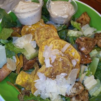 Wylie and Rum - Caesar salad with thin plantain chips and seasoned croutons. - Caribbean Near Me - Atlanta, Georgia