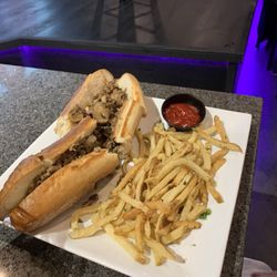 Off The Hook Comedy Club - Philly Cheesesteak