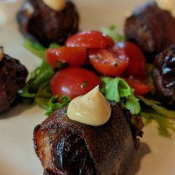 Rustica Eatery & Tavern - Medjool dates stuffed with chorizo and bacon-wrapped