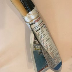 Photo of Mike & Son Sharpening Service - Brooklyn, NY, US. Sharp knives wrapped up in newspaper--ready to work.