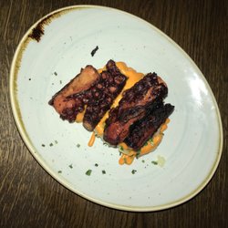 Ibérica - Absolutely amazing grilled octopus on a bead of potatoes.