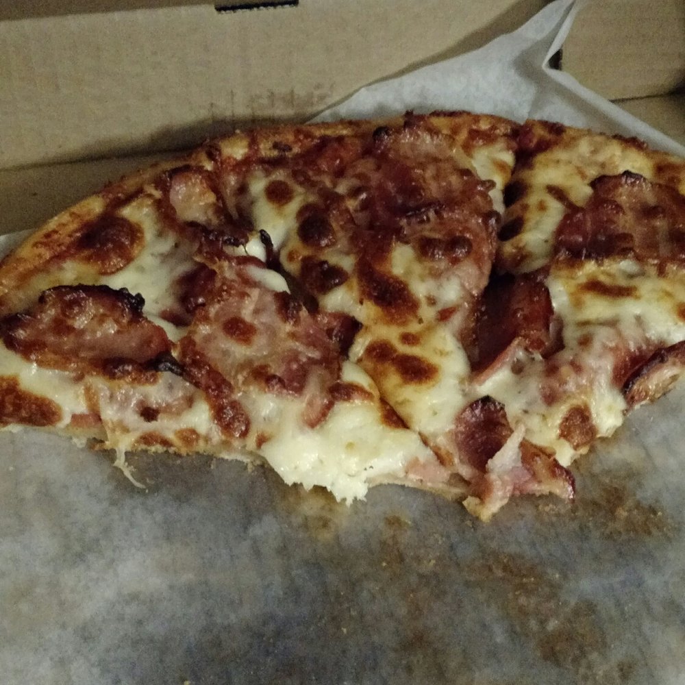 Penticton Pizza - Pepperoni and bacon pizza in this picture has the larger pepperoni slices. - Pizza Near Me - Penticton, British Columbia Penticton Pizza - Pepperoni and bacon pizza in this picture has the larger pepperoni slices. - Pizza Near Me - Penticton, British Columbia