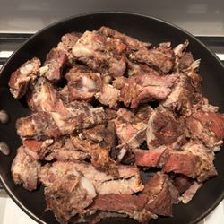 Kirk's BBQ - Warming to tenderize slithers and scraps of rib tips