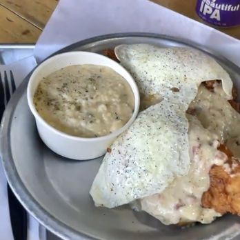 Se7enBites - E-I-E-I-O - a split biscuit topped with buttermilk fried chicken tenders with cheddar grits - Coffee & Tea Near Me - Orlando, Florida Se7enBites - E-I-E-I-O - a split biscuit topped with buttermilk fried chicken tenders with cheddar grits - Coffee & Tea Near Me - Orlando, Florida