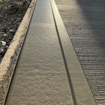 Clete Long IV Construction - a concrete walkway - General Contractors Near Me