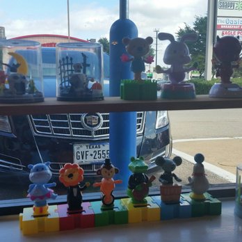 Oasis Restaurant - Cute solar bobble heads on the window sill! - Breakfast & Brunch Near Me - Dallas, Texas Oasis Restaurant - Cute solar bobble heads on the window sill! - Breakfast & Brunch Near Me - Dallas, Texas