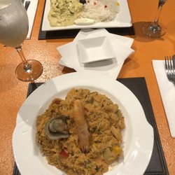 Rumba - Casa Latina - Seafood risotto, pisco sour, and chicken cheesy plate