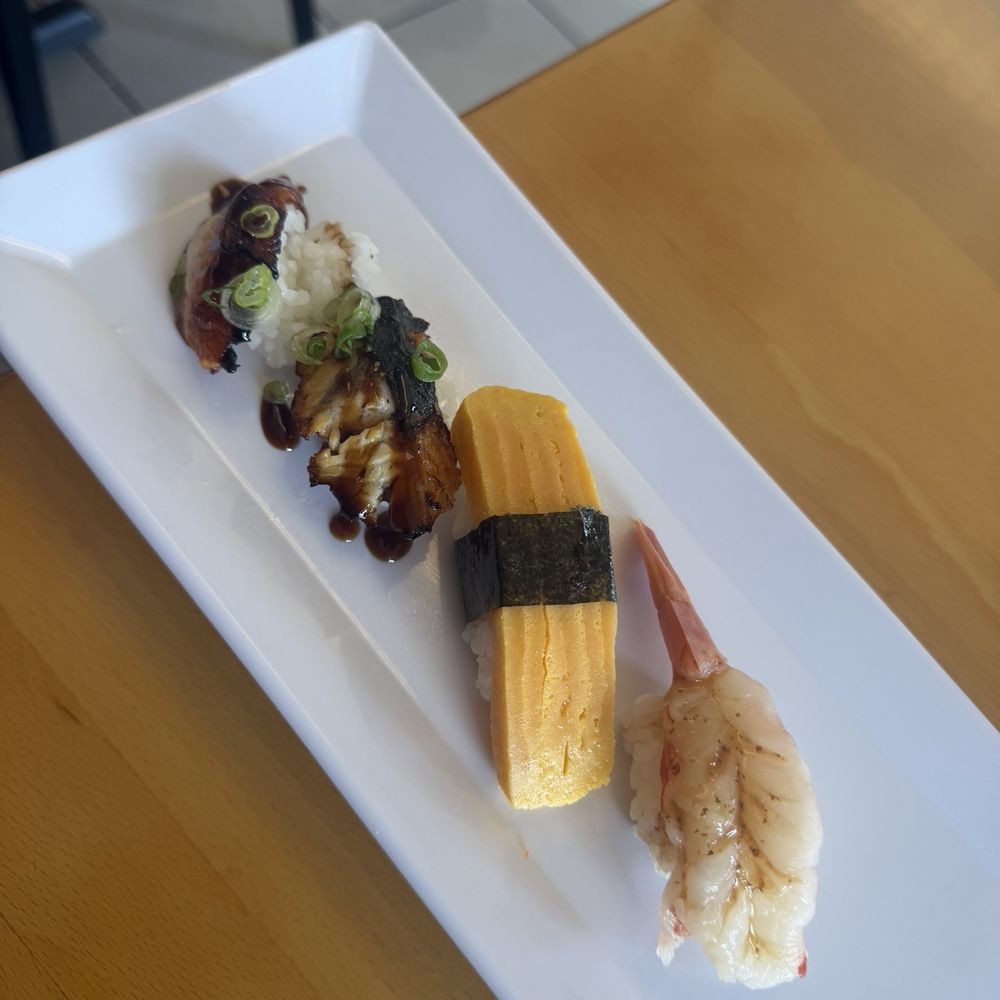 Bbq eel nigiri, tamago nigiri, & sweet shrimp nigiri Bbq eel nigiri, tamago nigiri, & sweet shrimp nigiri