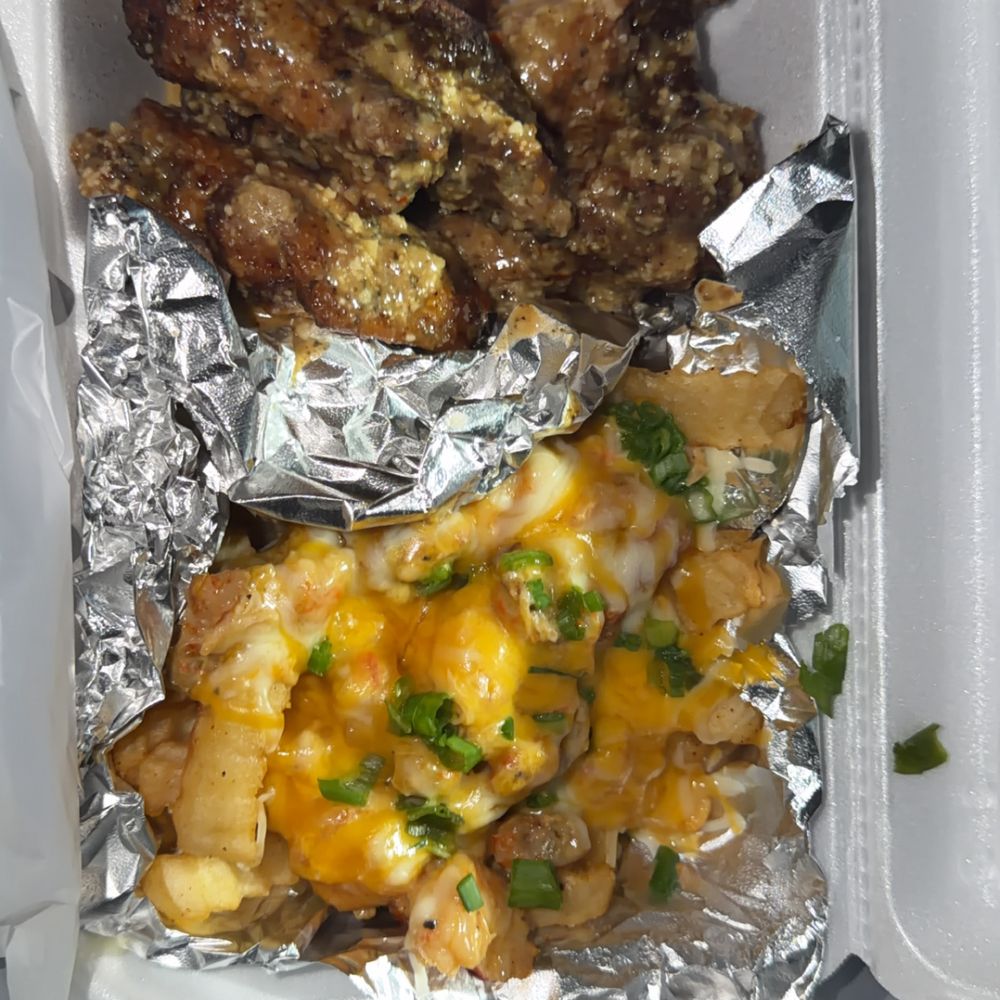 Bites By Bud Enterprises - garlic parm wings with bayou fries - Specialty Food Near Me - Baton Rouge, Louisiana Bites By Bud Enterprises - garlic parm wings with bayou fries - Specialty Food Near Me - Baton Rouge, Louisiana