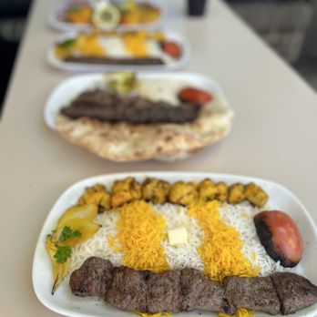 Maman Joon Kitchen Tysons - three plates of food - Persian/Iranian Near Me - Tysons, Virginia